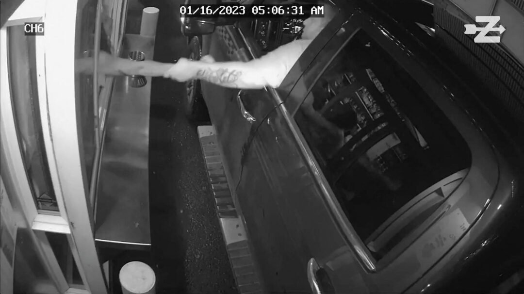Chilling moment suspected kidnapper tries to drag barista out of drive-thru window and into his pickup truck